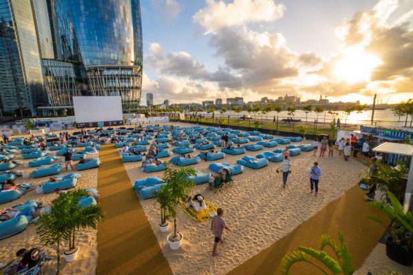 MOV’IN BED OUTDOOR CINEMA RETURNS TO BARANGAROO THIS SUMMER – NOW ON A BEACH!