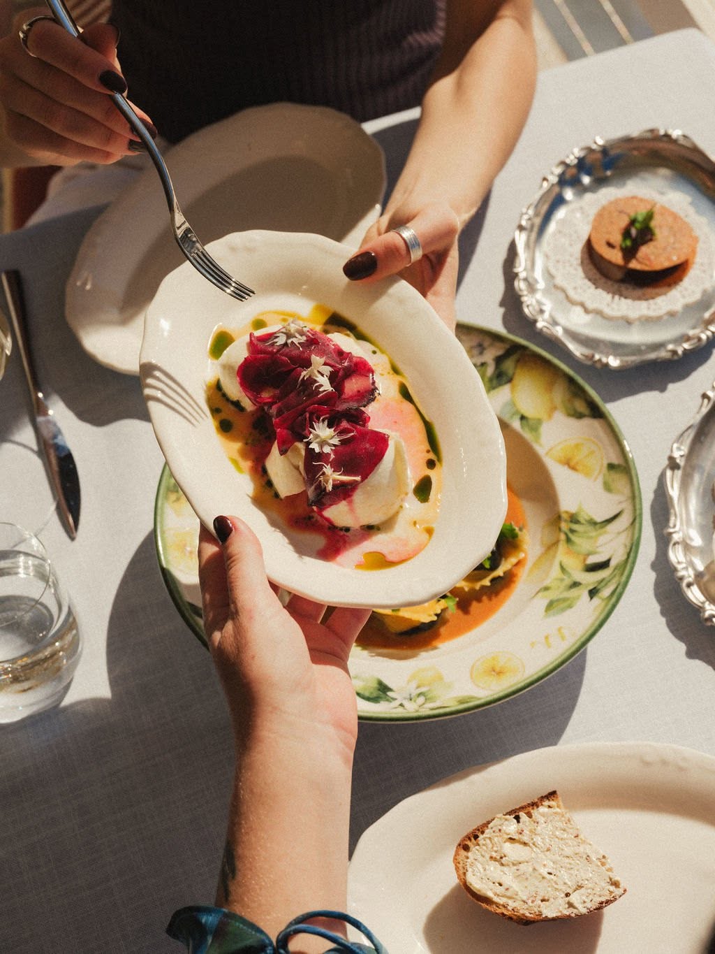 Italian share plates on the table at Riva Rose Bay
