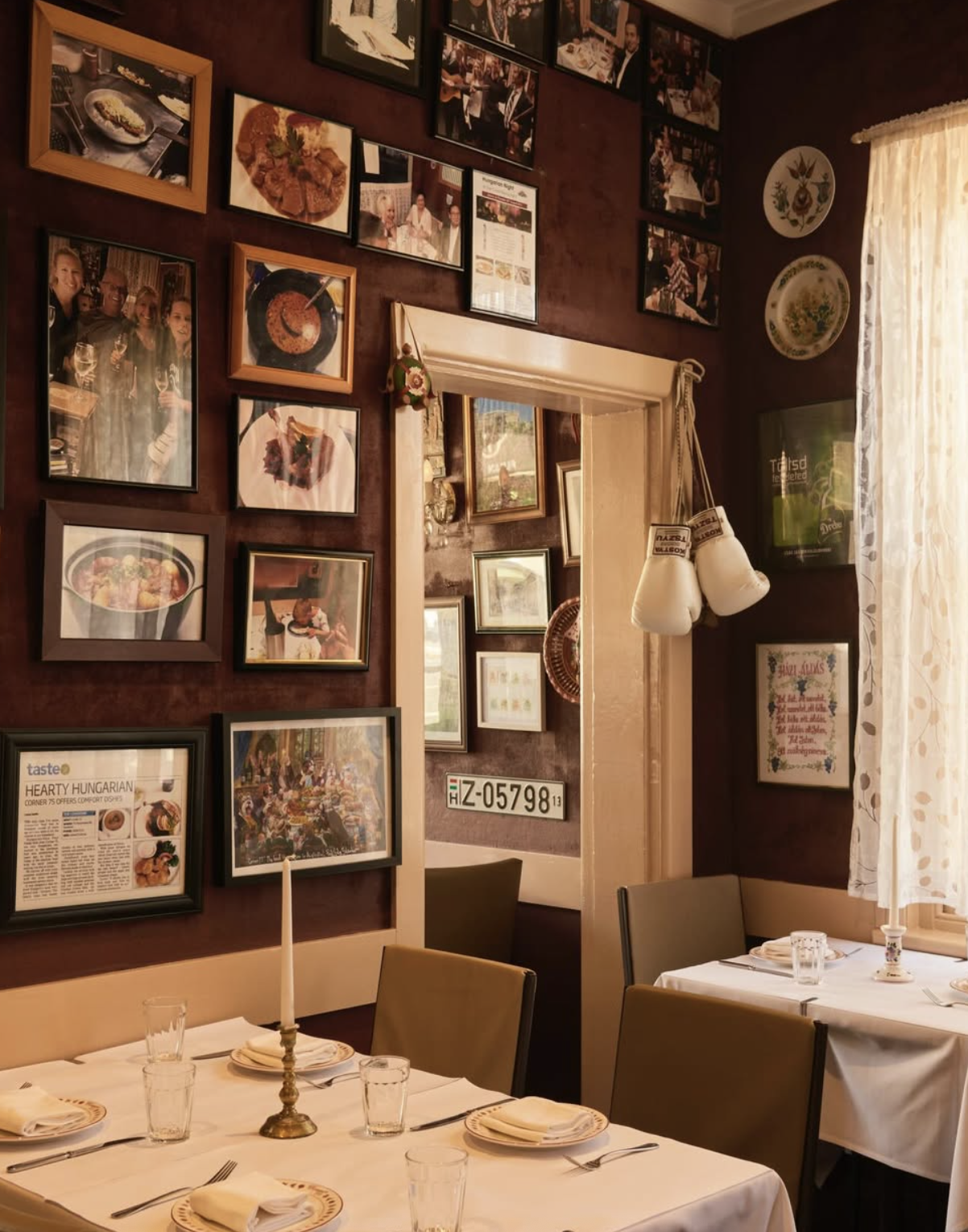 Hungarian photographs and memorabilia displayed inside Corner 75 Randwick