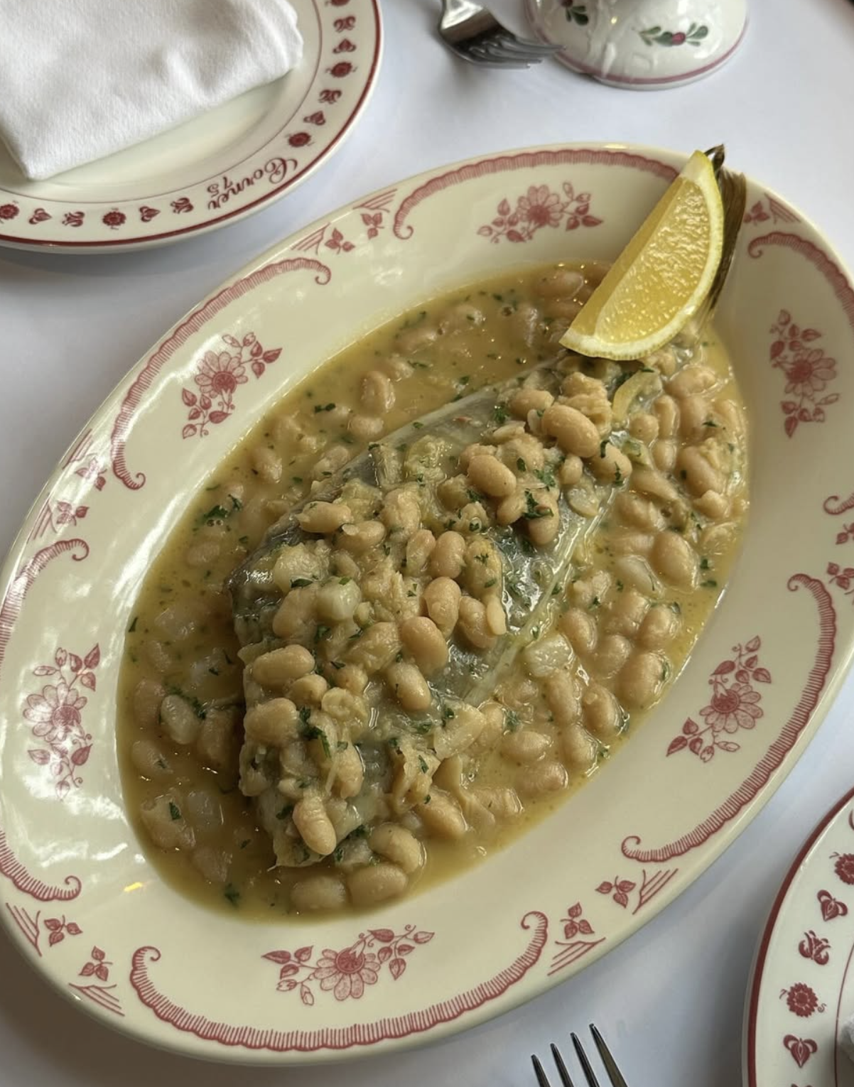 Poached John Dory with white beans and sauerkraut at Corner 75 Randwick